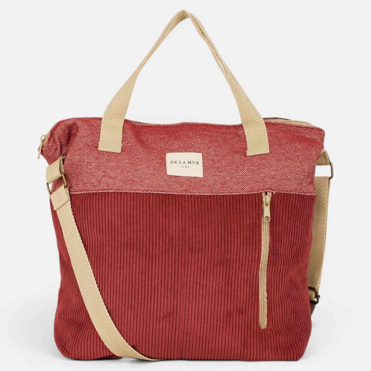 Bolso Arde, estampado en rojo, beige, gris, detalle del estampado y el material — De La Mur