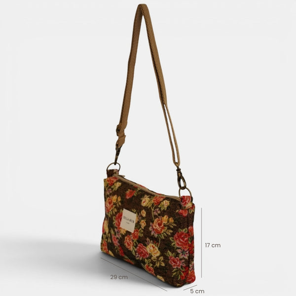 Bolso clutch Pepi, estampado en naranja, terracota, gris, detalle del producto — De La Mur