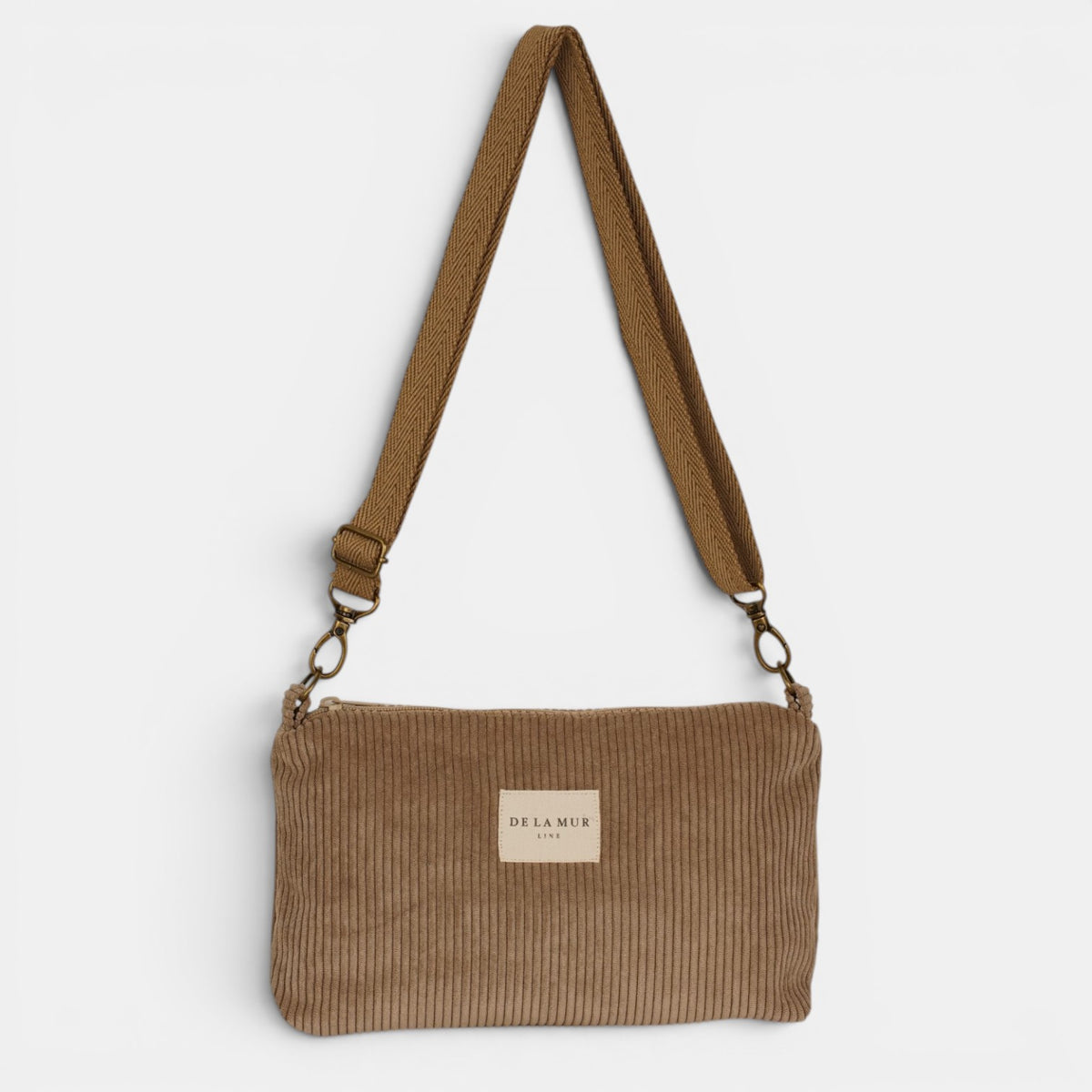 Bolso clutch Toast, estampado en rojo, blanco, azul, detalle del estampado y el material — De La Mur