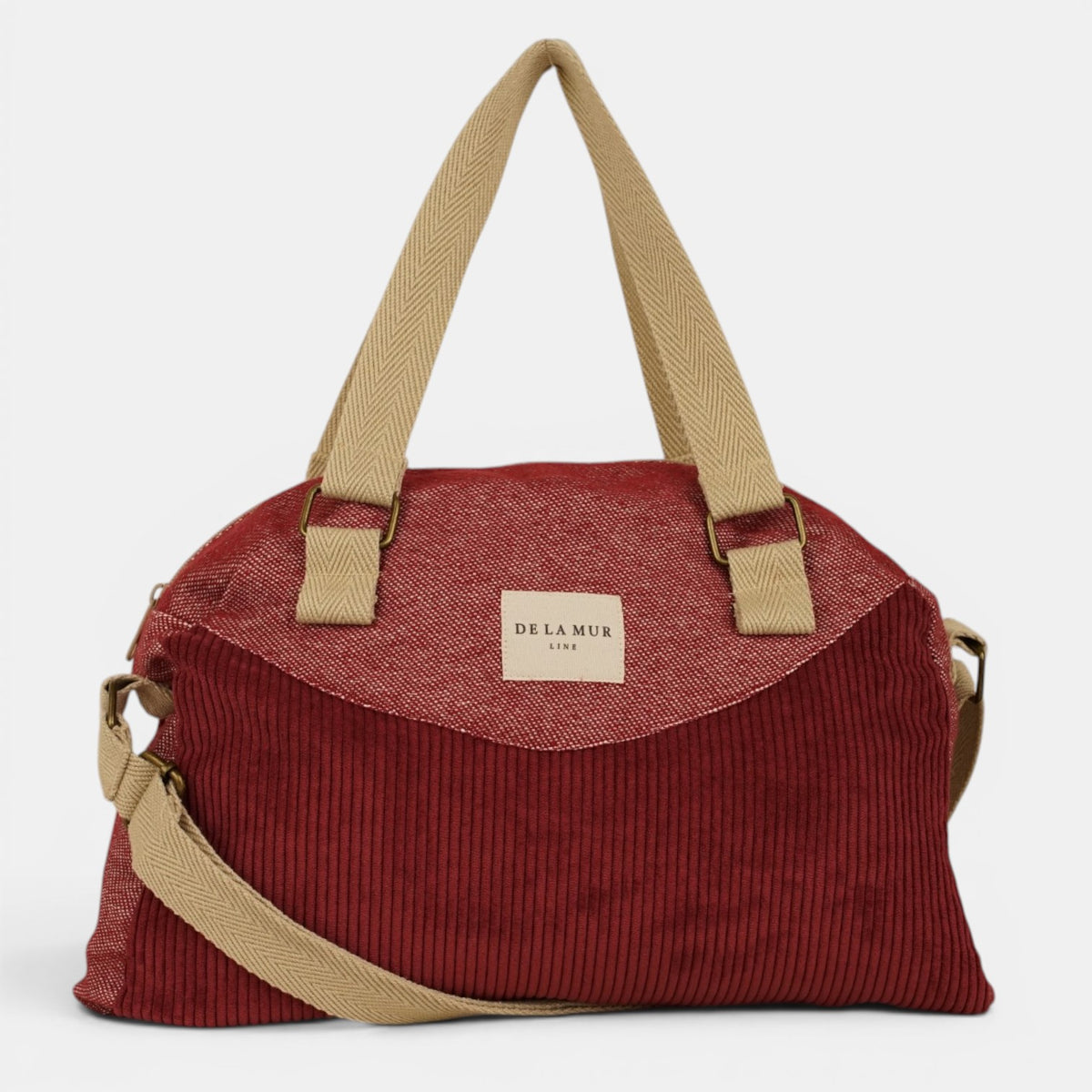 Bolso Arde, estampado en rojo, beige, gris, detalle del estampado y el material — De La Mur