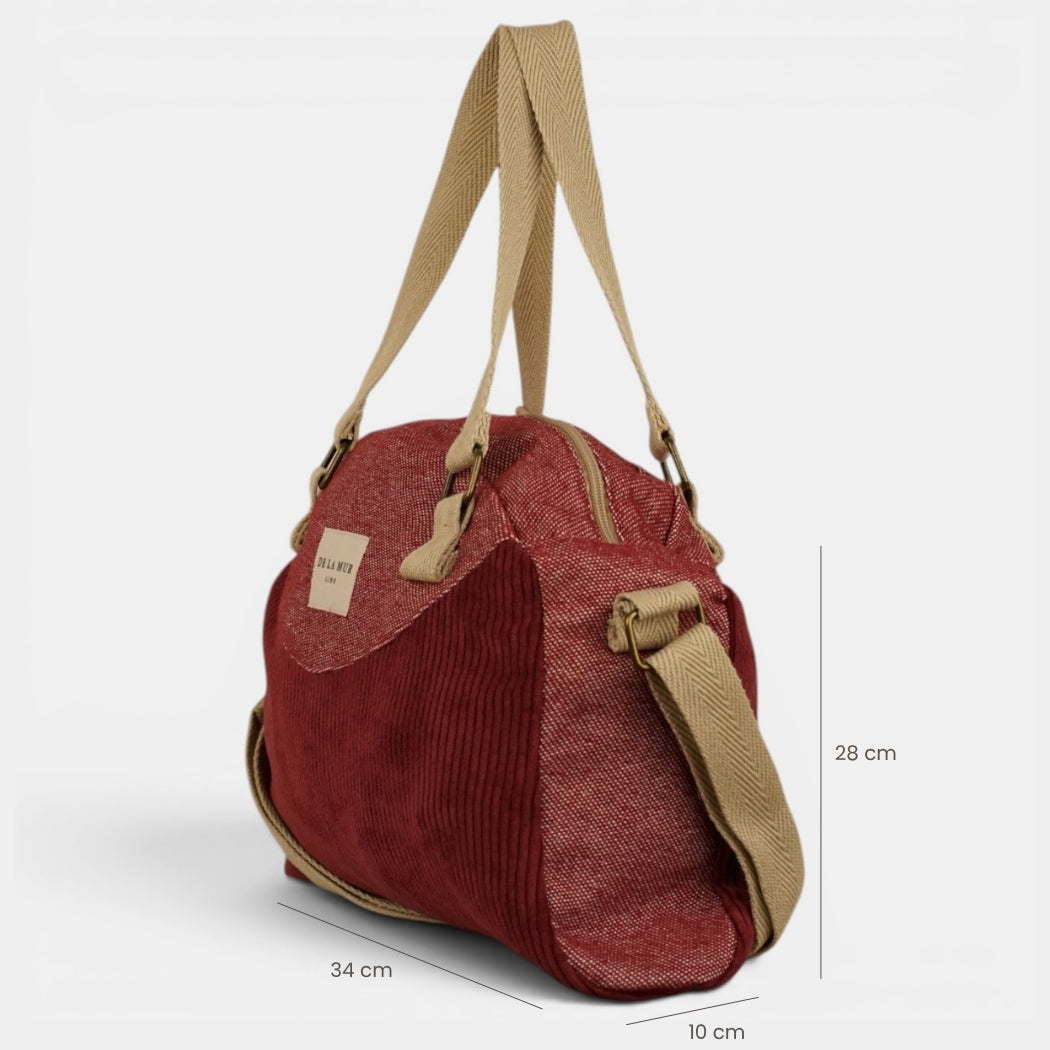 Bolso Arde, estampado en rojo, beige, gris, detalle del material y el acabado — De La Mur