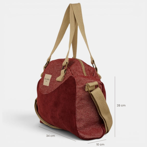 Bolso Arde, estampado en rojo, beige, gris, detalle del material y el acabado — De La Mur