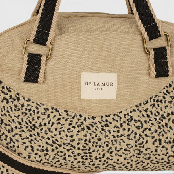 Bolso Koto, estampado en beige, negro, blanco, detalle del producto — De La Mur