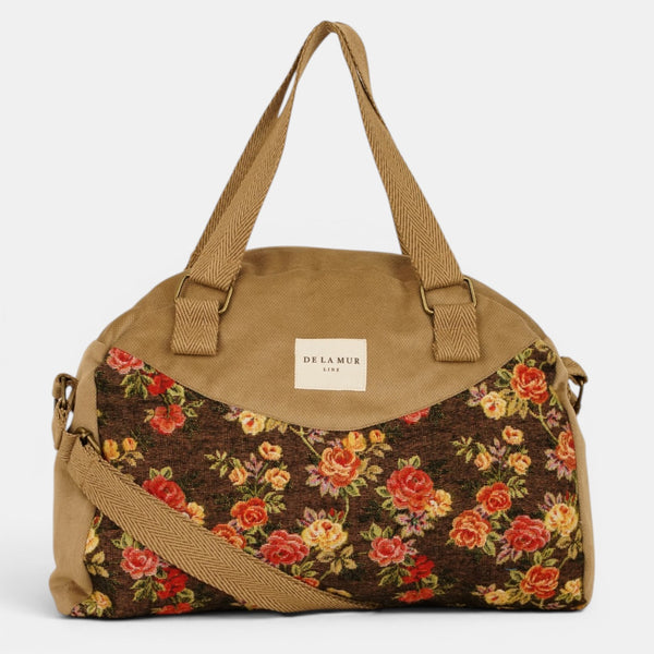 Bolso Pepi, estampado en naranja, terracota, beige, detalle del material y el acabado — De La Mur