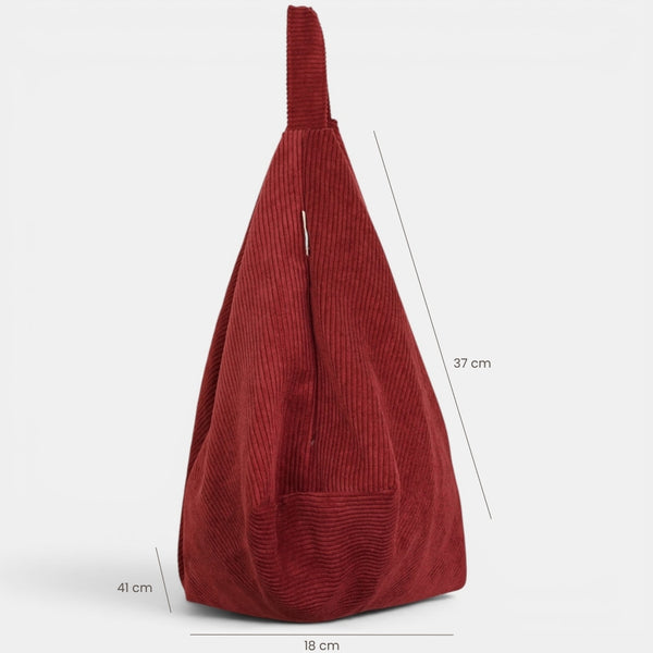 Bolso Arde, estampado en rojo, negro, beige, detalle del producto — De La Mur