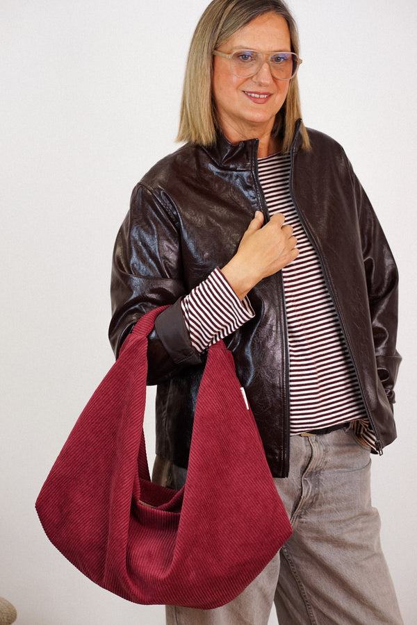 Bolso Arde, estampado en rojo, negro, beige, vista frontal — De La Mur