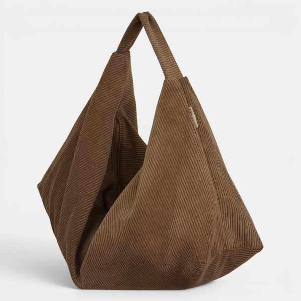 Bolso Toast, estampado en rojo, naranja, terracota, detalle del material y el acabado — De La Mur