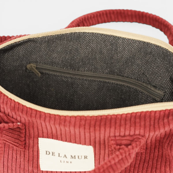 Bolso Arde, estampado en rojo, beige, blanco, detalle del producto — De La Mur