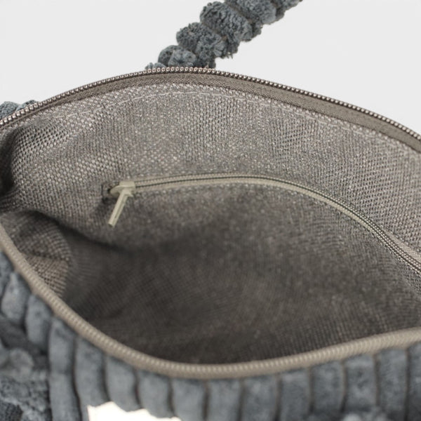Bolso Curly, estampado en beige, negro, blanco, detalle del producto — De La Mur