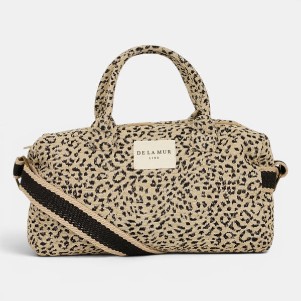 Bolso Koto, estampado en blanco, negro, azul, detalle del material y el acabado — De La Mur