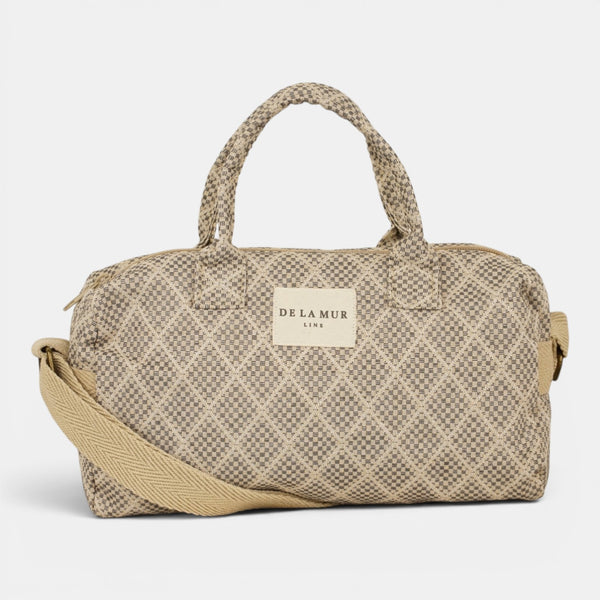 Bolso Pant, estampado en negro, blanco, beige, detalle del estampado y el material — De La Mur