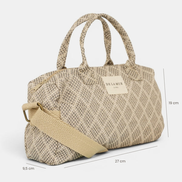 Bolso Pant, estampado en negro, blanco, beige, detalle del material y el acabado — De La Mur