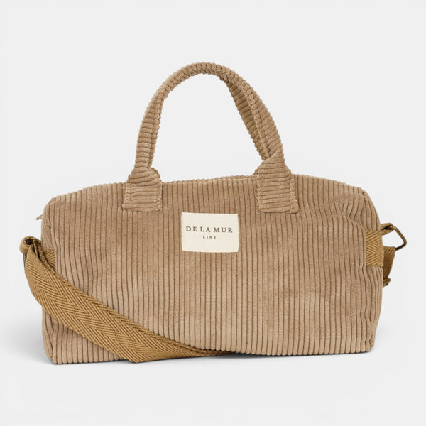 Bolso Toast, estampado en rojo, beige, terracota, detalle del material y el acabado — De La Mur