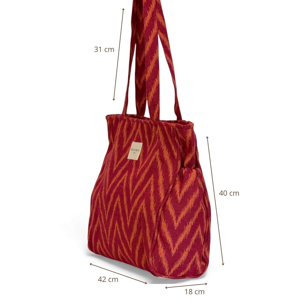 Bolsa con cremallera Fuego, estampado en rojo, naranja y amarillo, detalle del material y el acabado — De La Mur