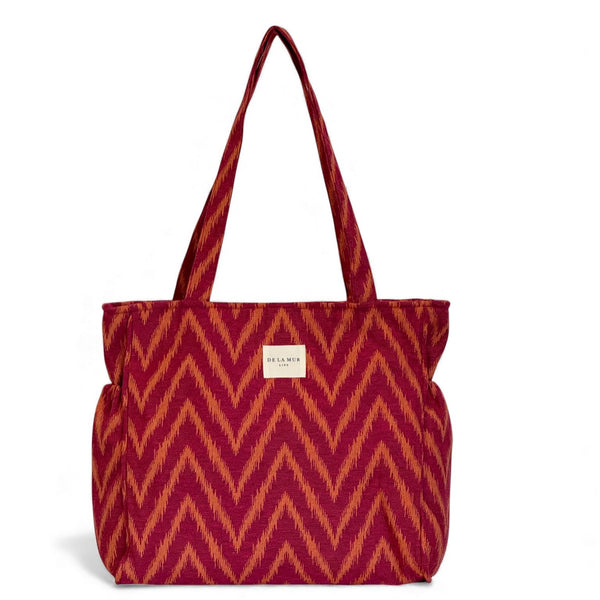 Bolsa con cremallera Fuego, estampado en rojo, naranja y amarillo, vista frontal — De La Mur