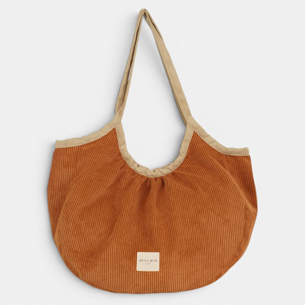 Bolso Barro, estampado en terracota, beige, rojo, detalle del estampado y el material — De La Mur