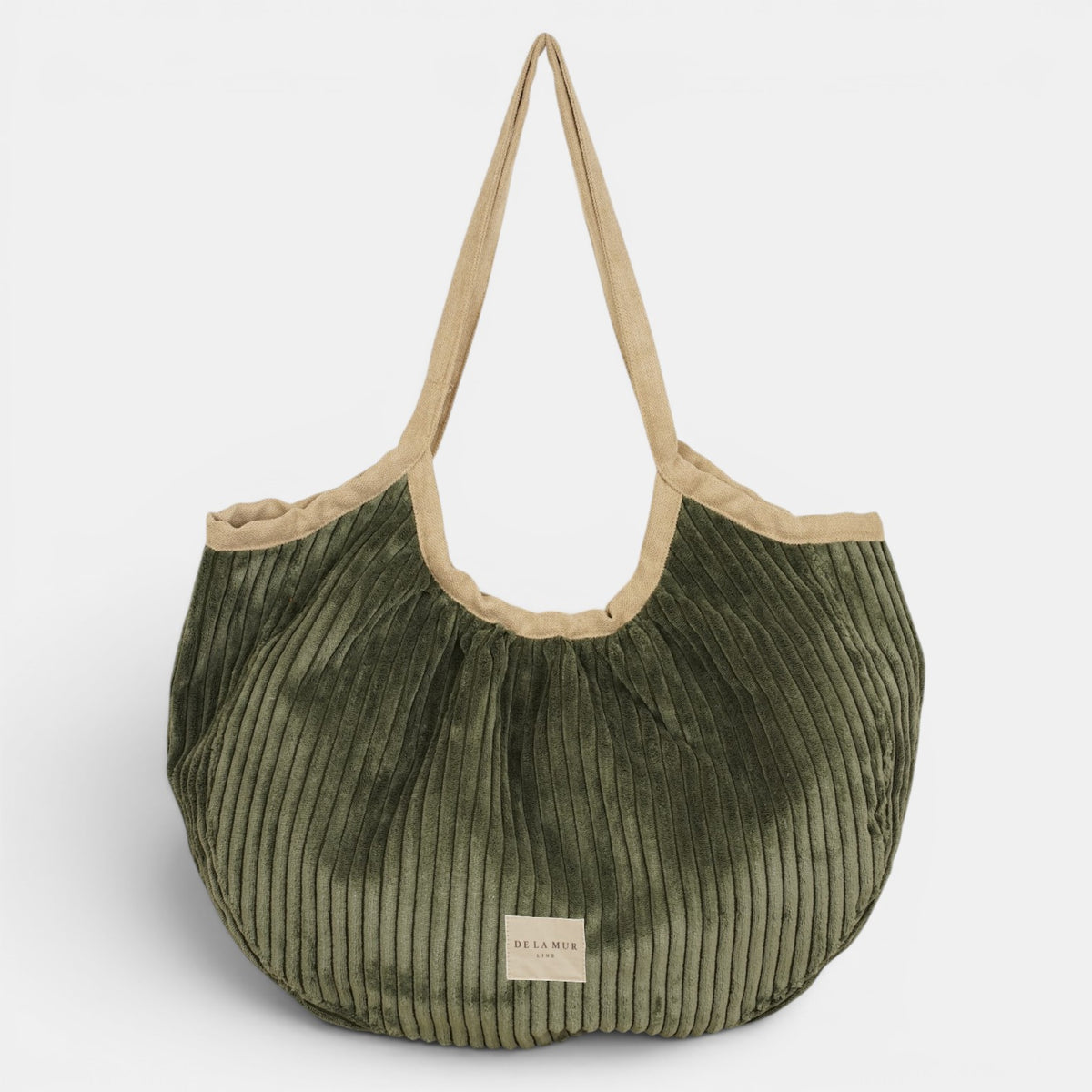 Bolso Musgo, acabado verde musgo, detalle del estampado y el material — De La Mur