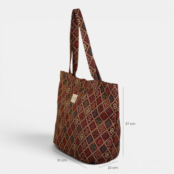 Bolsa grande con cremallera Chic, estampado en negro, blanco, rojo, detalle del material y el acabado — De La Mur