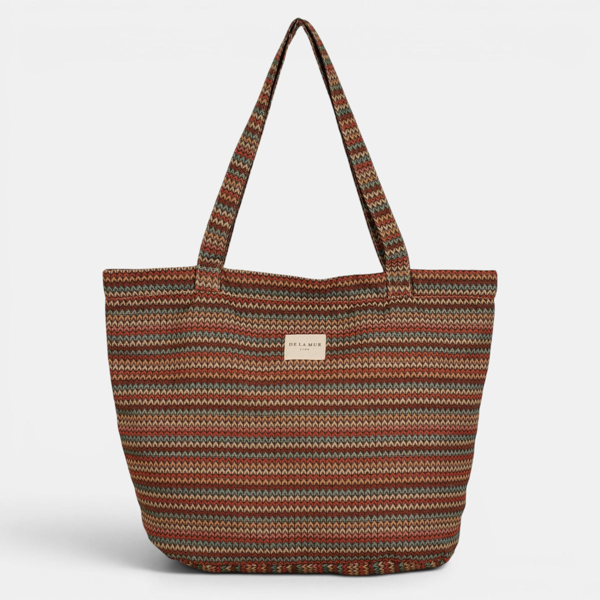 Bolsa grande con cremallera Fron, estampado en blanco, beige, marrón, detalle del estampado y el material — De La Mur
