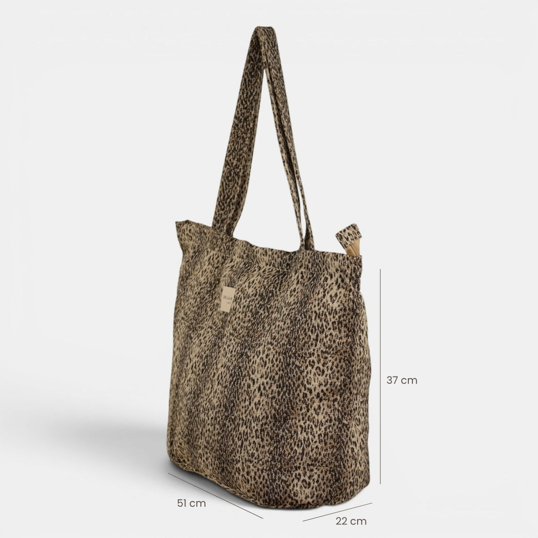 Bolsa grande con cremallera Leo, estampado en negro, beige, marrón, detalle del material y el acabado — De La Mur