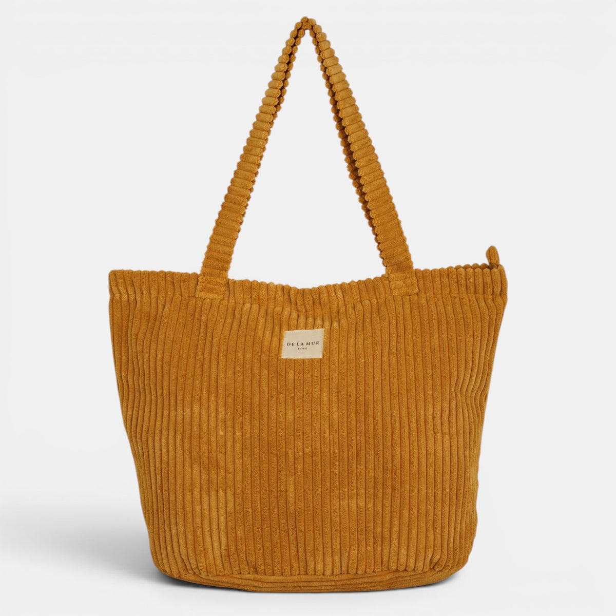 Bolsa grande con cremallera Maiz, acabado amarillo maíz y beige, vista trasera — De La Mur