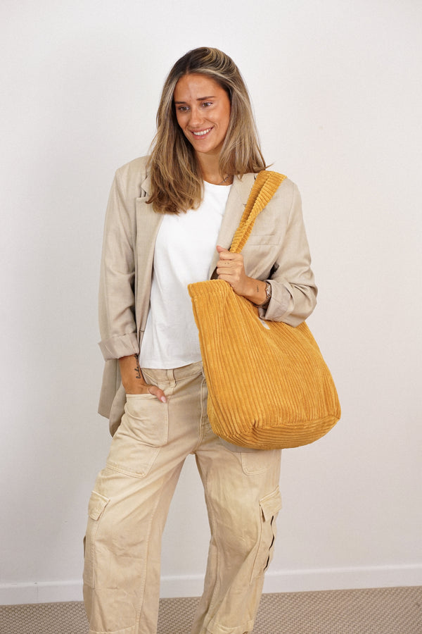 Bolsa grande con cremallera Maiz, acabado amarillo maíz y beige, vista trasera — De La Mur