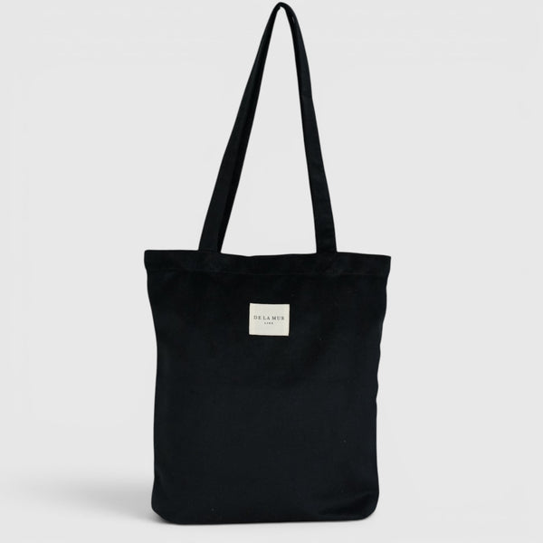 Bolsa pequeña Aza, acabado negro, vista frontal — De La Mur