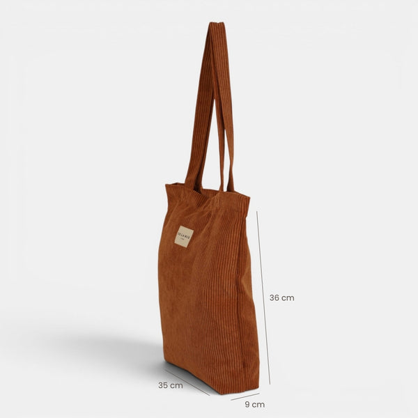 Bolsa pequeña Barro, estampado en terracota, beige, blanco, detalle del material y el acabado — De La Mur
