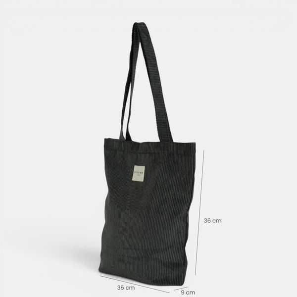 Bolsa pequeña Boni, estampado en gris, verde, turquesa, vista en uso — De La Mur
