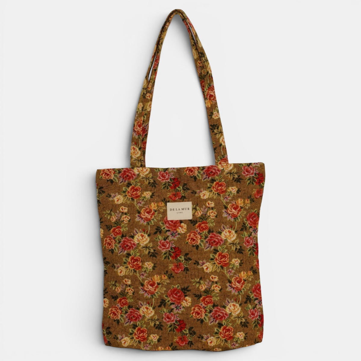 Bolsa pequeña Esme, estampado en beige, terracota, rojo, detalle del estampado y el material — De La Mur