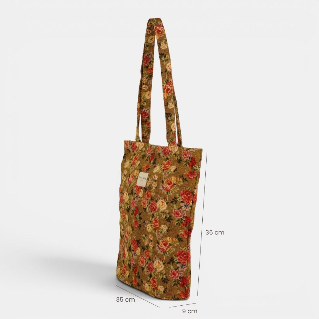 Bolsa pequeña Esme, estampado en beige, terracota, rojo, detalle del material y el acabado — De La Mur