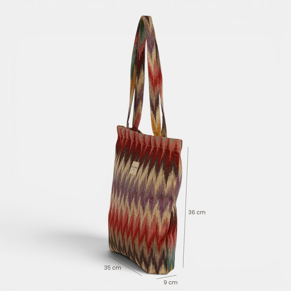 Bolsa pequeña Guana, estampado en blanco, beige, terracota, detalle del material y el acabado — De La Mur