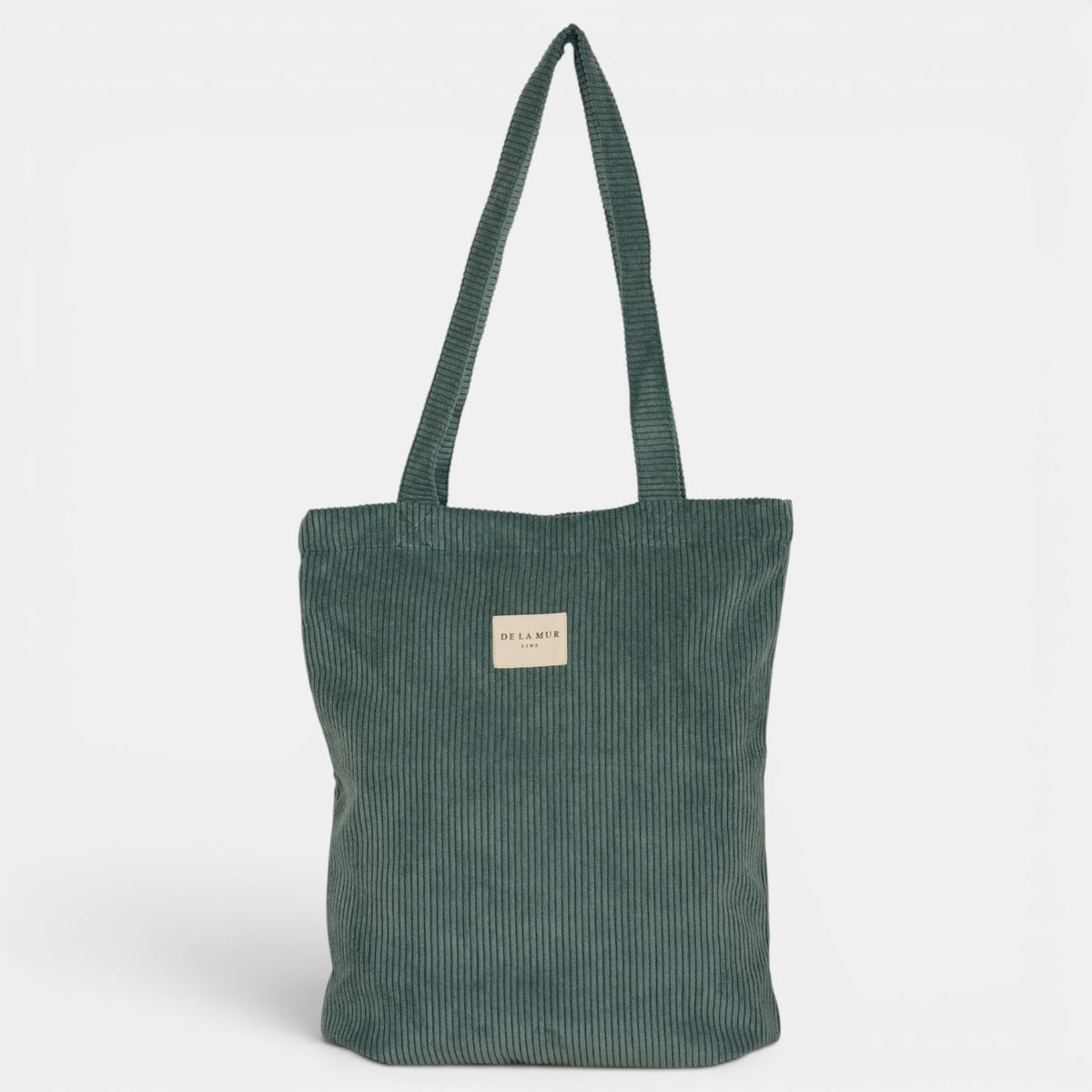 Bolsa pequeña Jade, acabado verde jade, vista en uso — De La Mur