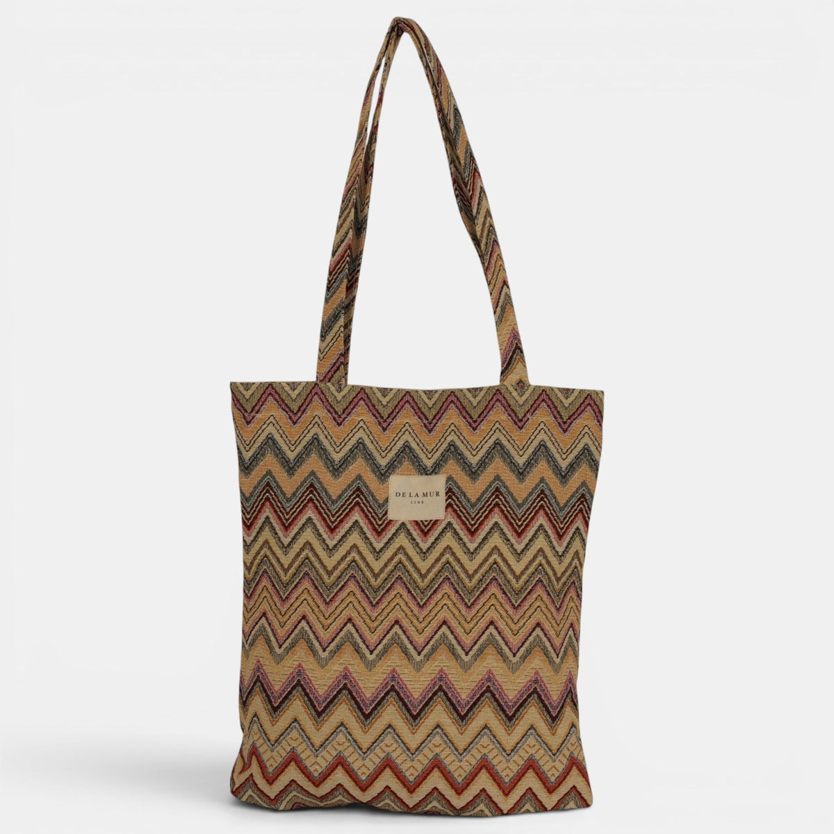 Bolsa pequeña Kers, estampado en negro, beige, marrón, detalle del estampado y el material — De La Mur