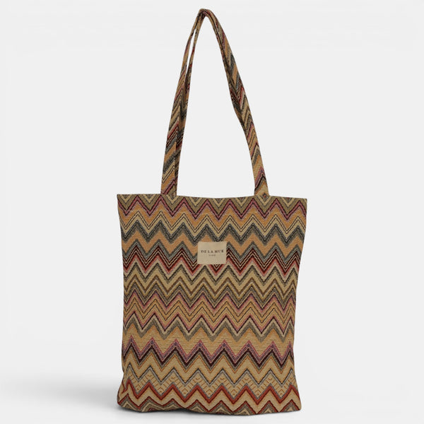 Bolsa pequeña Kers, estampado en negro, beige, marrón, detalle del estampado y el material — De La Mur