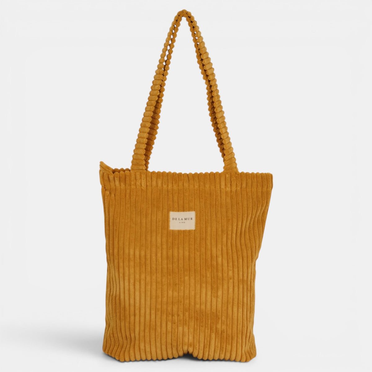 Bolsa pequeña Maiz, acabado amarillo maíz y beige, vista trasera — De La Mur