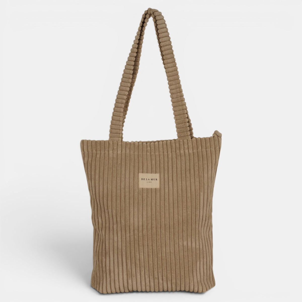 Bolsa pequeña Moka, estampado en beige, blanco, rojo, detalle del estampado y el material — De La Mur