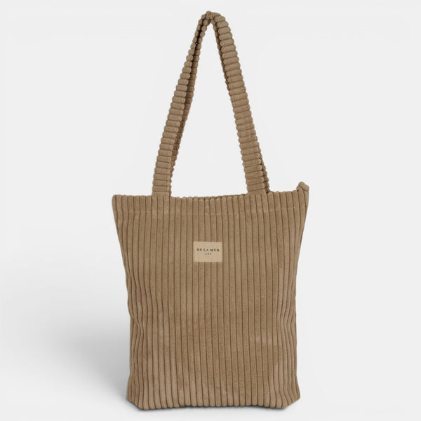 Bolsa pequeña Moka, estampado en beige, blanco, rojo, detalle del estampado y el material — De La Mur