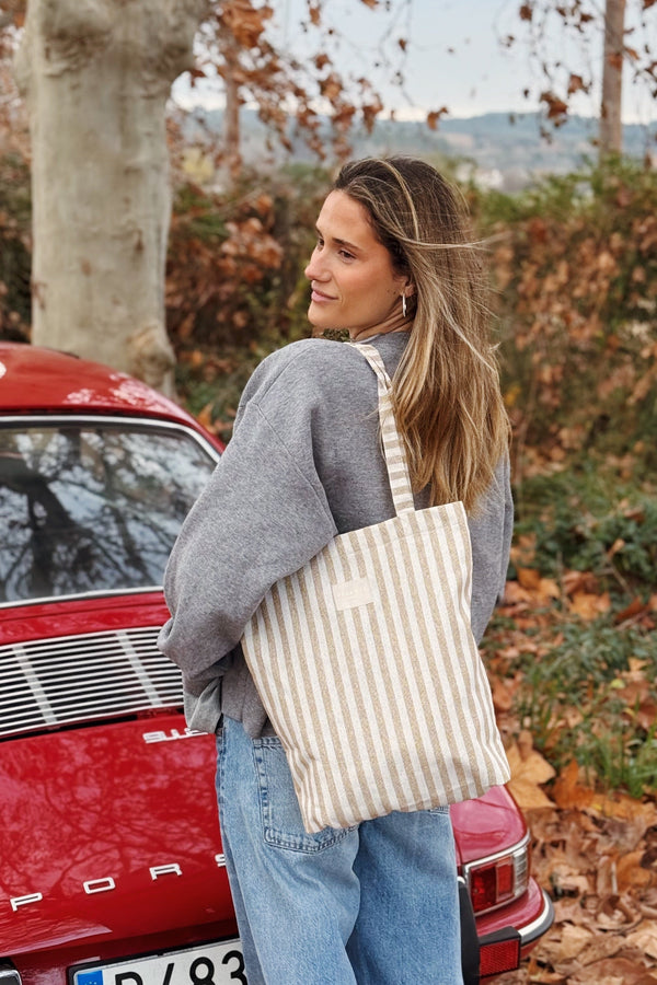 Bolsa pequeña Lumos, estampado en marrón, beige, blanco, detalle del producto — De La Mur