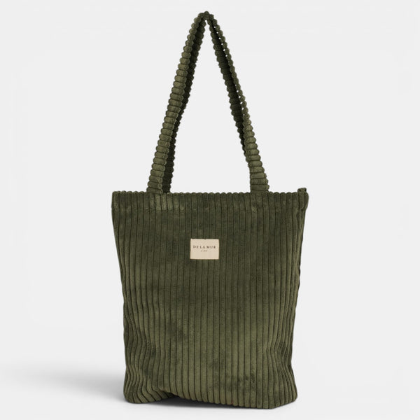 Bolsa pequeña Musgo, acabado verde musgo, detalle del estampado y el material — De La Mur
