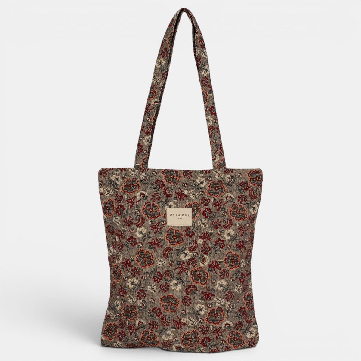 Bolsa pequeña Nira, estampado en azul, beige, blanco, detalle del estampado y el material — De La Mur