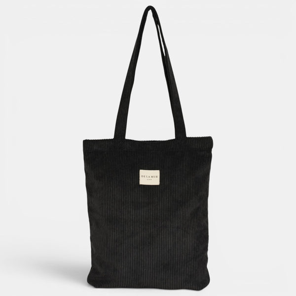 Bolsa pequeña Nit, estampado en negro, terracota, naranja, detalle del estampado y el material — De La Mur