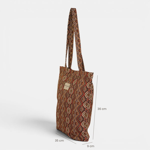 Bolsa pequeña Otto, estampado en negro, beige, gris, detalle del material y el acabado — De La Mur