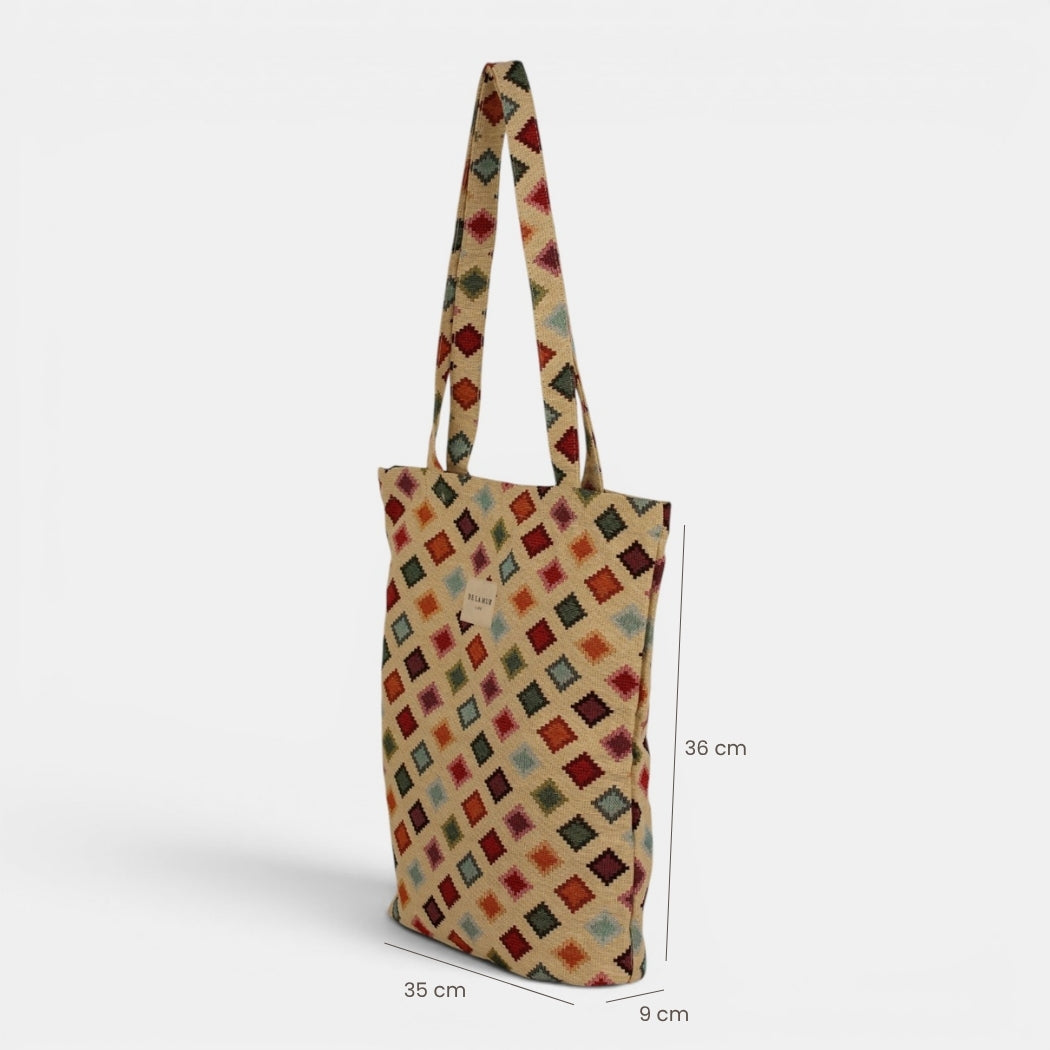 Bolsa pequeña Zac, estampado en beige, azul, terracota, detalle del material y el acabado — De La Mur