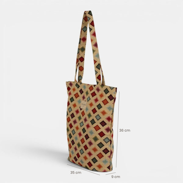 Bolsa pequeña Zac, estampado en beige, azul, terracota, detalle del material y el acabado — De La Mur
