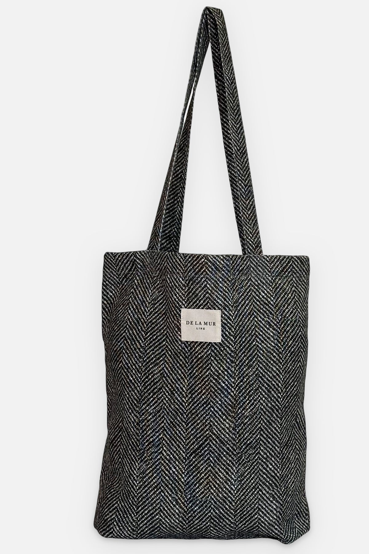 Petit sac Dope, imprimé dans les tons gris, blanc et jaune, vue de face — De La Mur