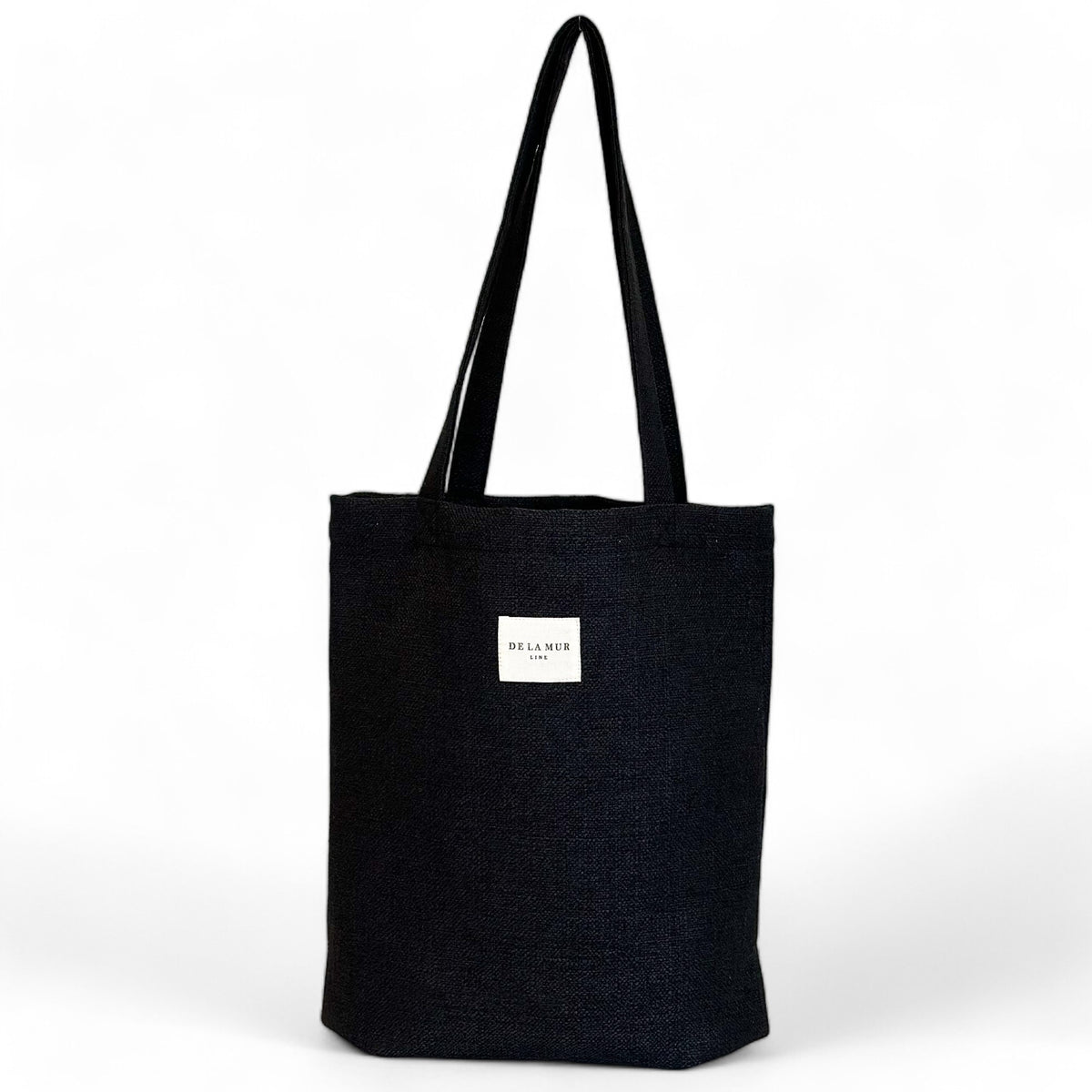 Bolsa pequeña Mad, acabado negro, vista frontal — De La Mur
