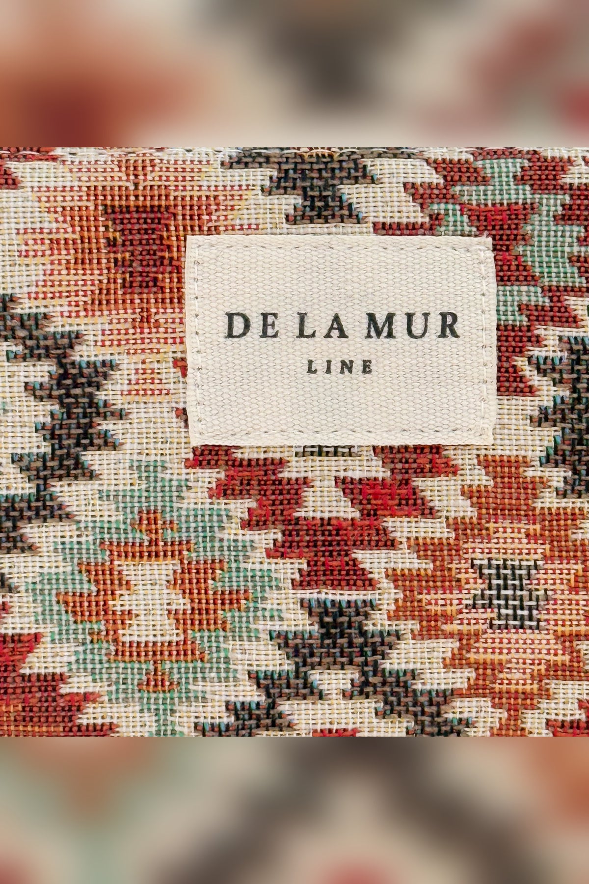 Bea coin purse, print in brown, red and beige, in use — De La Mur