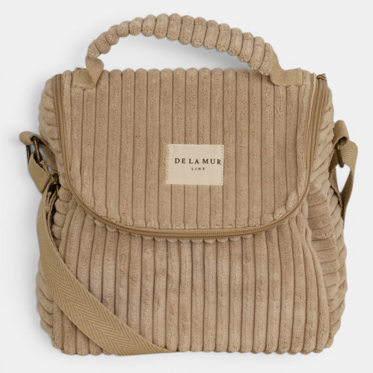 Bolso Moka, estampado en beige, negro, marrón, detalle del estampado y el material — De La Mur