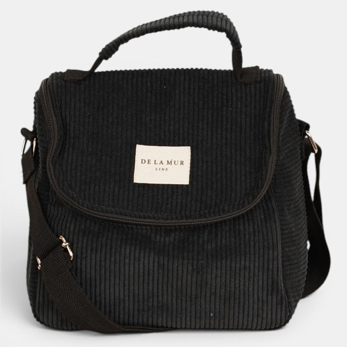 Bolso Nit, estampado en blanco, negro, terracota, detalle del estampado y el material — De La Mur